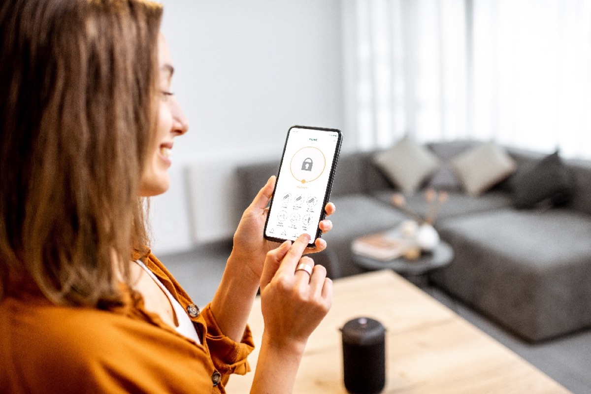 A tenant using her phone at home